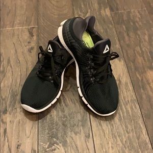 Black Reebok sneakers